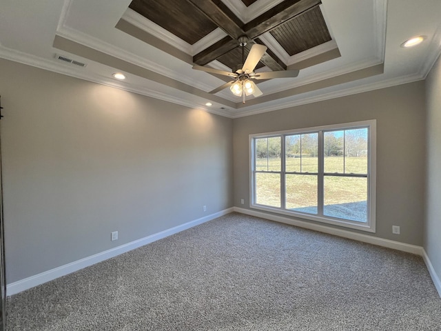 empty room featuring carpet, ceiling fan, ornamental molding, and coffered ceiling