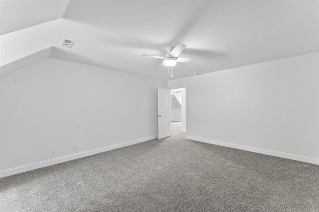 interior space featuring ceiling fan and carpet floors