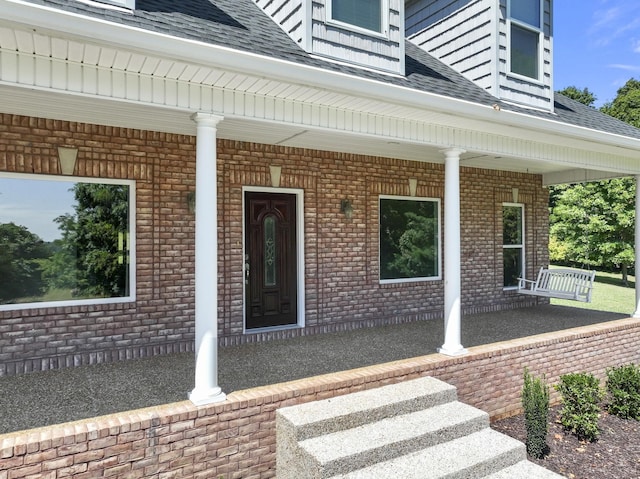 property entrance with a porch