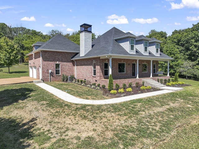 view of front of property featuring covered porch, central AC unit, a garage, and a front lawn