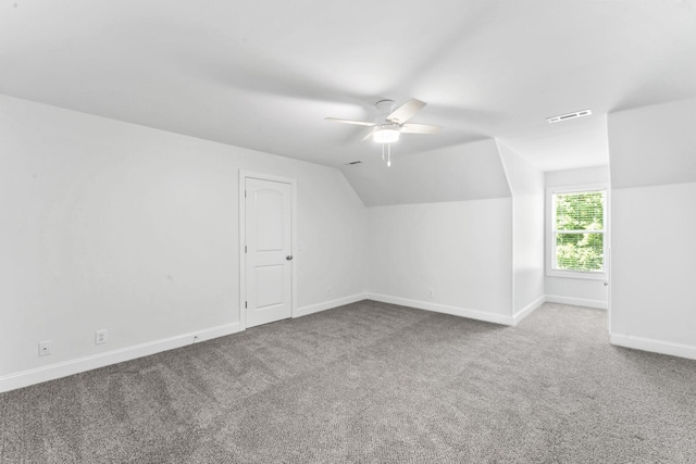 bonus room featuring ceiling fan, carpet, and vaulted ceiling