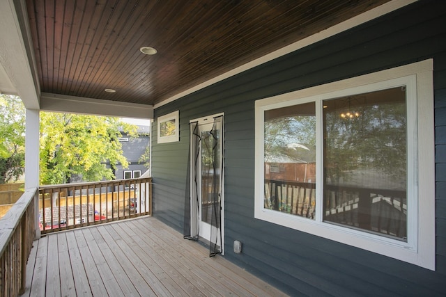 wooden terrace featuring a porch