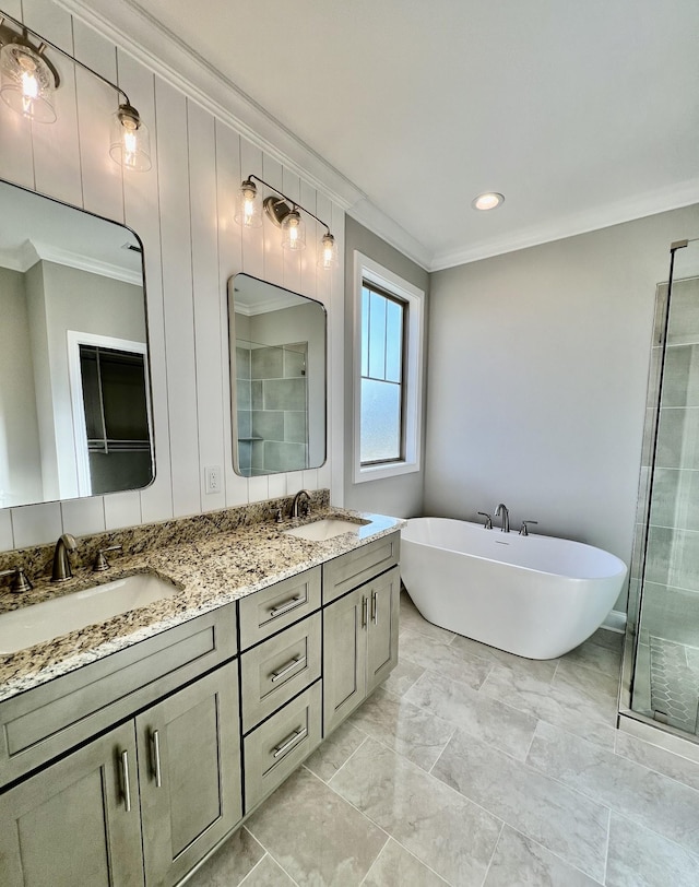 bathroom featuring vanity, crown molding, and plus walk in shower