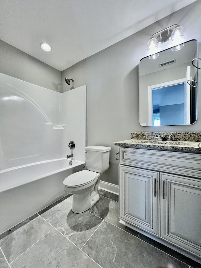 full bathroom featuring shower / tub combination, vanity, and toilet