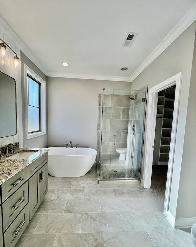 bathroom featuring vanity, ornamental molding, and plus walk in shower