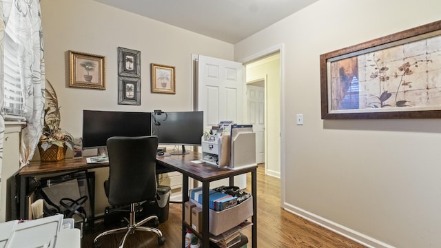 office space featuring hardwood / wood-style flooring