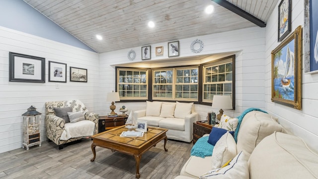 living room with vaulted ceiling, wooden ceiling, and wood walls