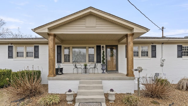 view of front of property featuring covered porch