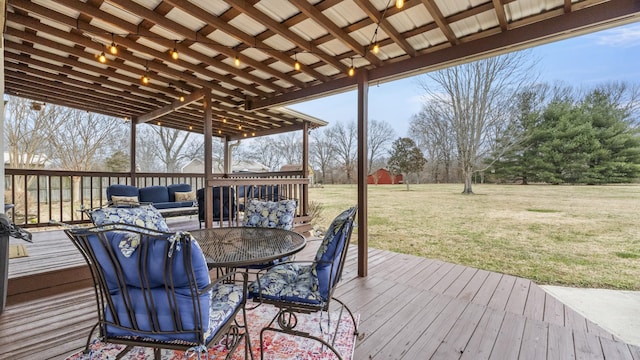 wooden terrace featuring outdoor lounge area and a yard