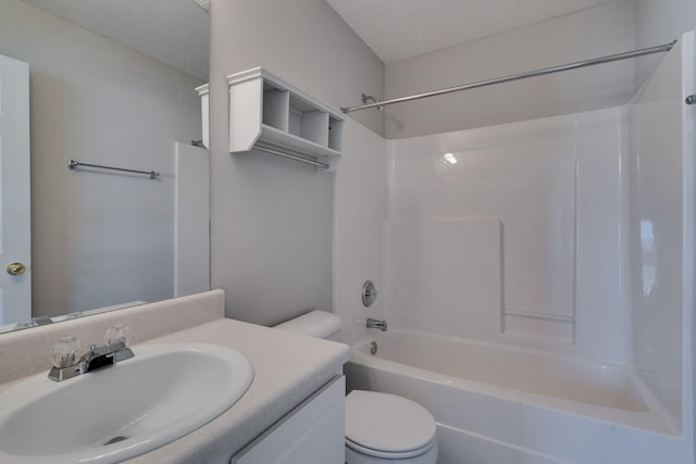 full bathroom featuring shower / tub combination, vanity, a textured ceiling, and toilet