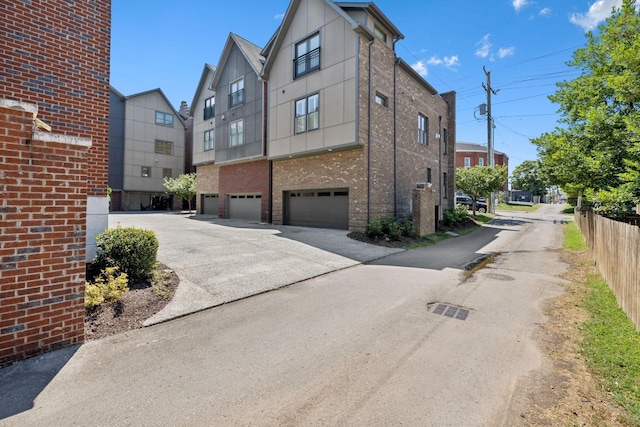 view of side of property featuring a garage