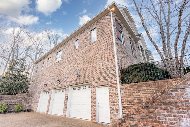 view of home's exterior with a garage