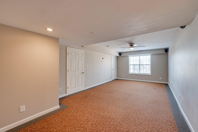 carpeted empty room with ceiling fan