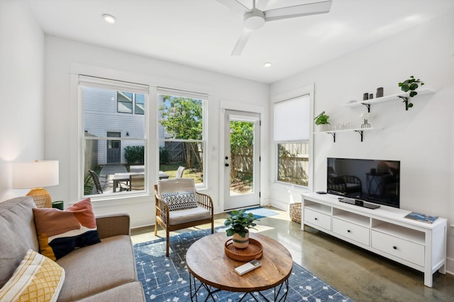 living room featuring ceiling fan