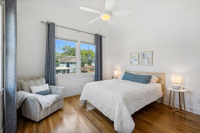 bedroom featuring hardwood / wood-style flooring and ceiling fan