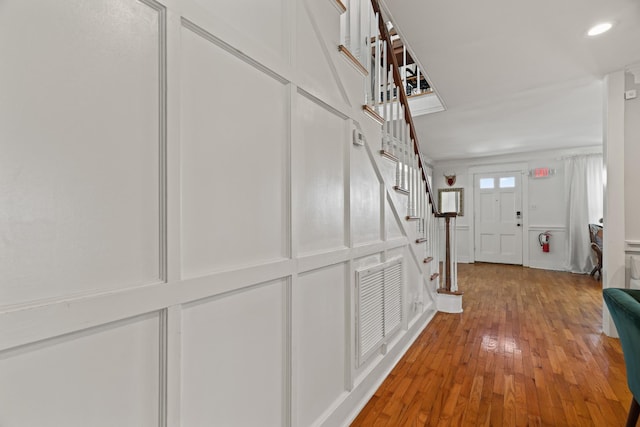 hall with light hardwood / wood-style flooring