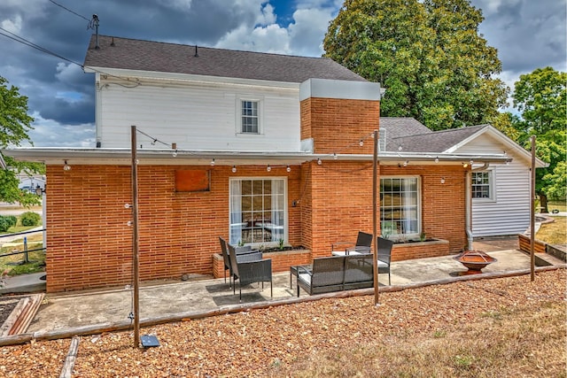 back of house featuring a patio