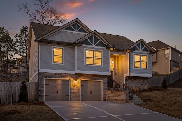 view of front of property with a garage