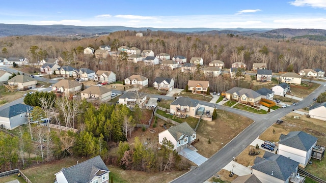 birds eye view of property featuring a mountain view