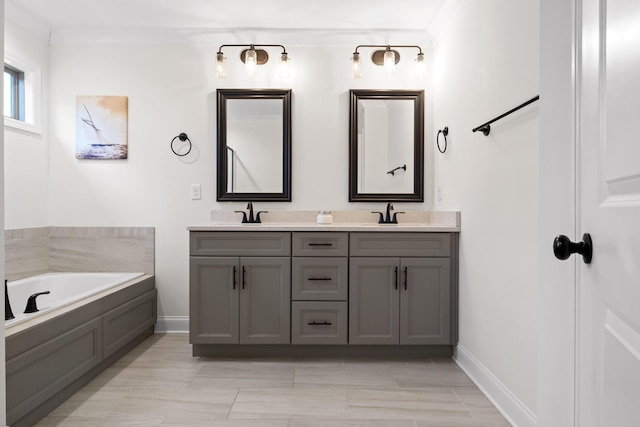 bathroom featuring vanity and a tub to relax in