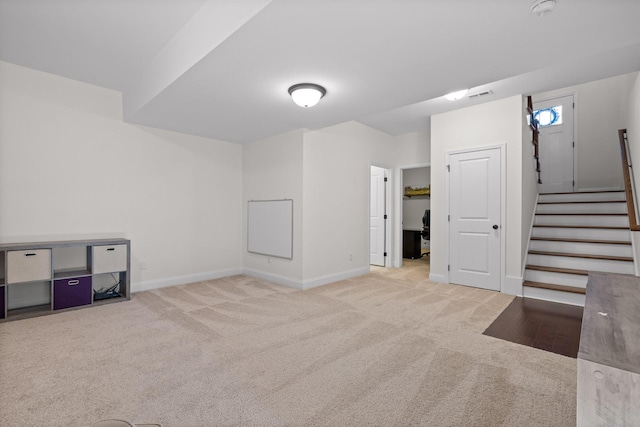 basement with light carpet