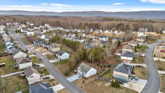 birds eye view of property featuring a mountain view