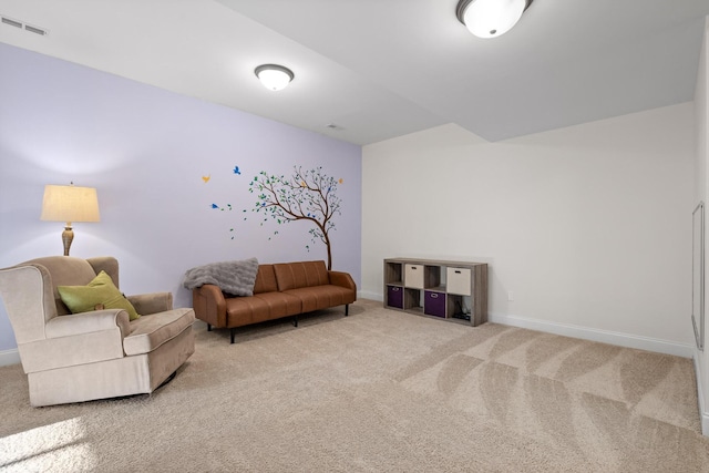 living area featuring carpet flooring