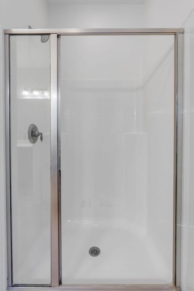 bathroom with an enclosed shower