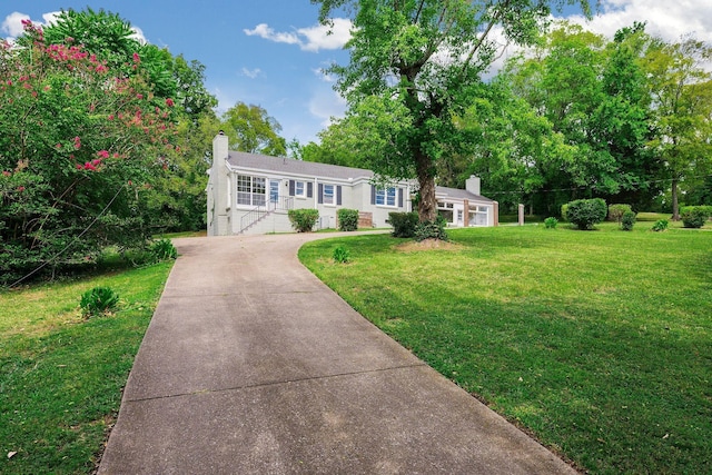 ranch-style house with a front yard