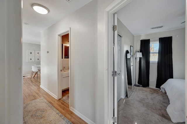 hall featuring light hardwood / wood-style floors