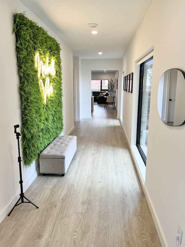 corridor featuring light wood-type flooring