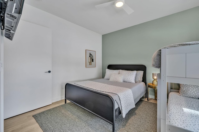 bedroom featuring wood-type flooring and ceiling fan