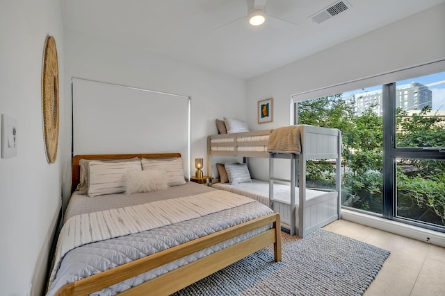 bedroom featuring ceiling fan and light wood-type flooring