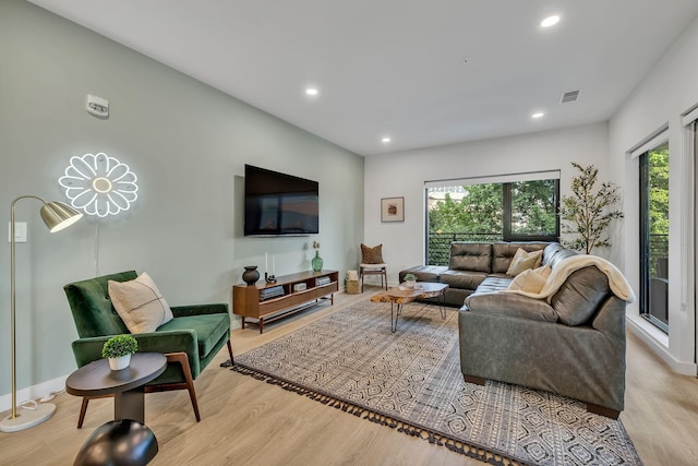 living room with light wood-type flooring