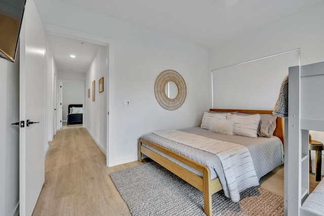 bedroom with light hardwood / wood-style flooring