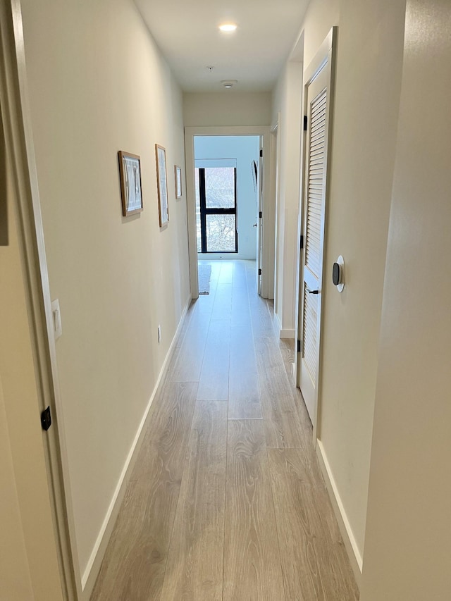 corridor featuring light wood-type flooring