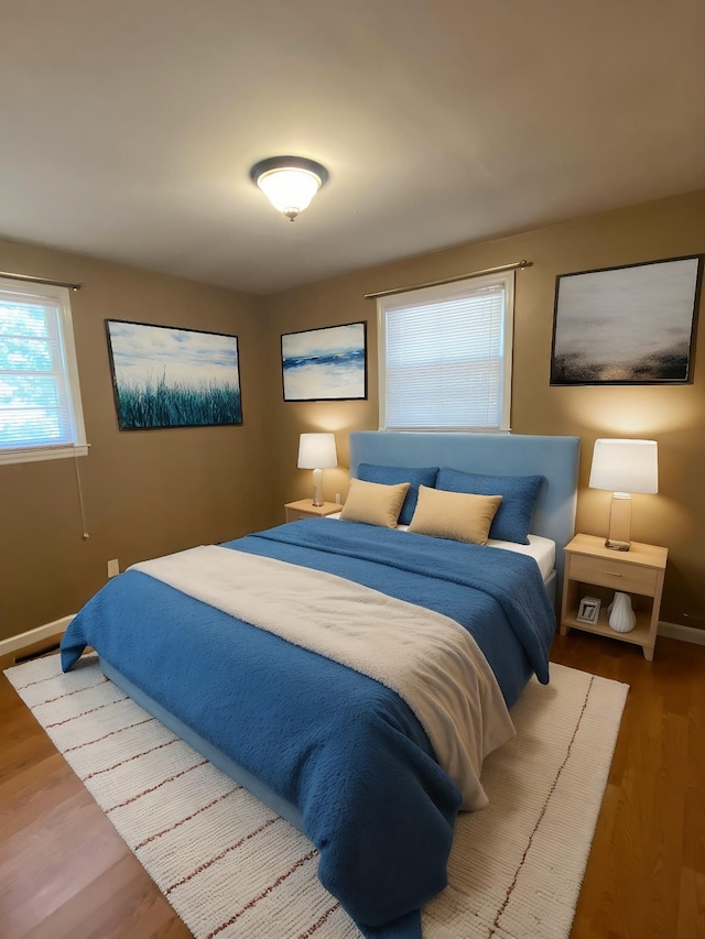 bedroom featuring hardwood / wood-style floors