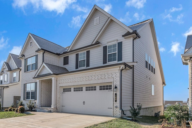 front of property featuring a garage