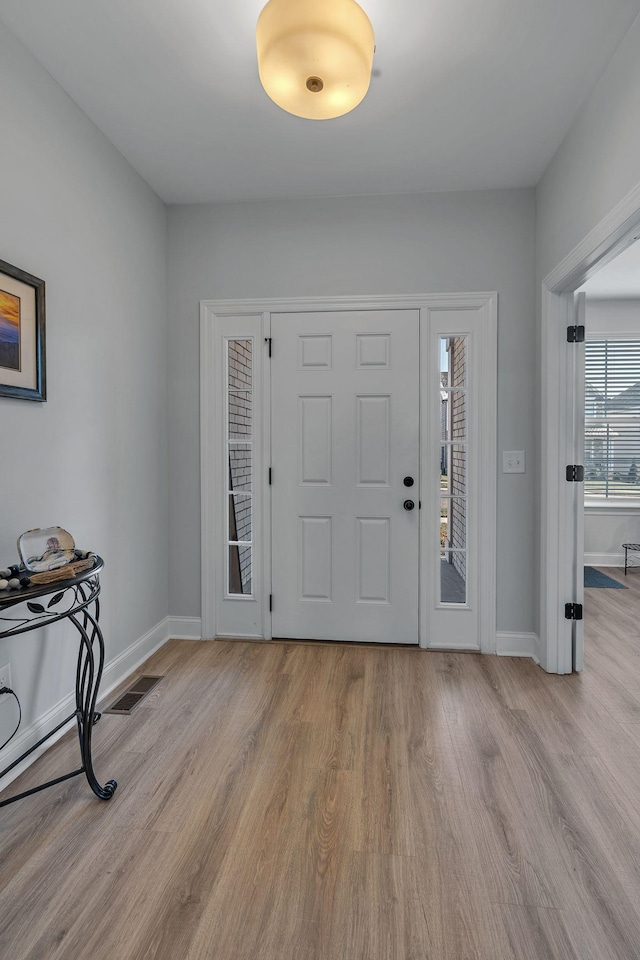 entrance foyer featuring light wood-type flooring