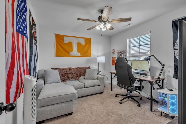 office space featuring carpet flooring and ceiling fan