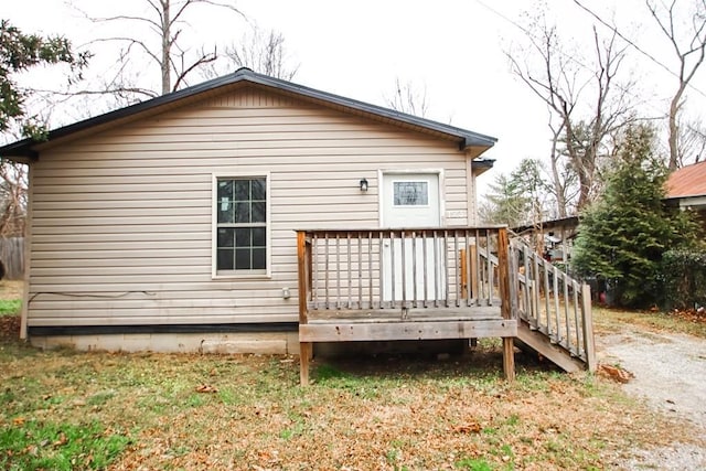 rear view of house with a deck