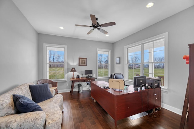 office area featuring dark hardwood / wood-style flooring and ceiling fan