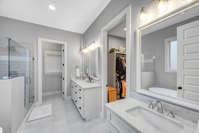 bathroom with vanity and an enclosed shower