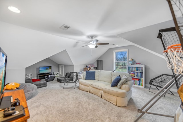 carpeted living room with vaulted ceiling and ceiling fan