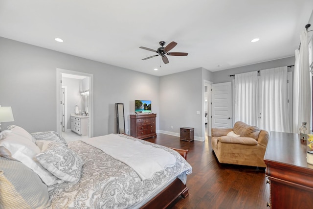 bedroom with ceiling fan, dark hardwood / wood-style flooring, and connected bathroom