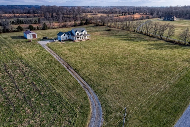 birds eye view of property featuring a rural view