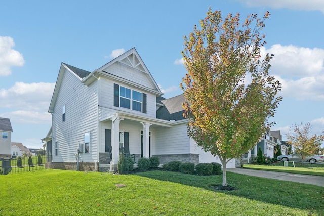 view of front facade featuring a front yard