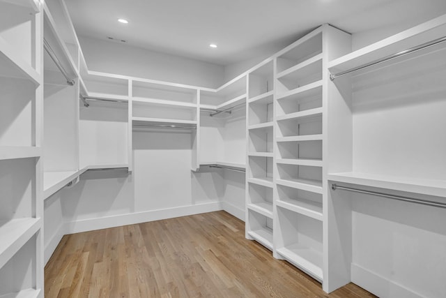 walk in closet featuring light wood-type flooring