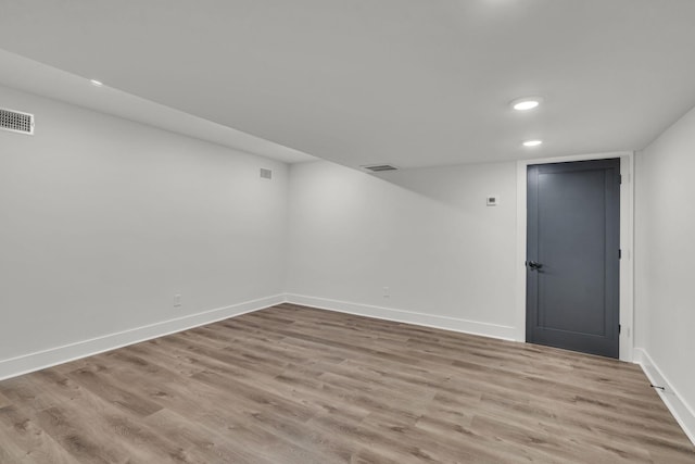 unfurnished room featuring light wood-type flooring