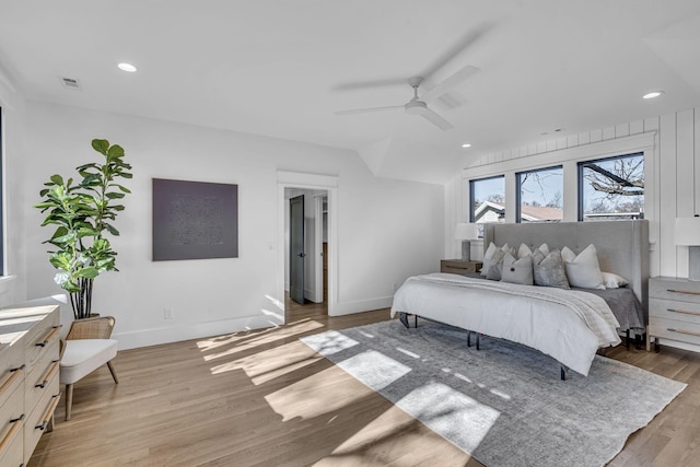 bedroom featuring ceiling fan and light hardwood / wood-style flooring